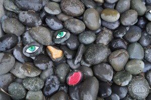 painted stone facial features